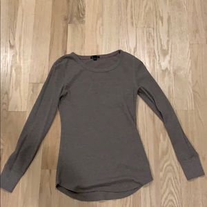 a brown/beige long sleeve tee from gap
